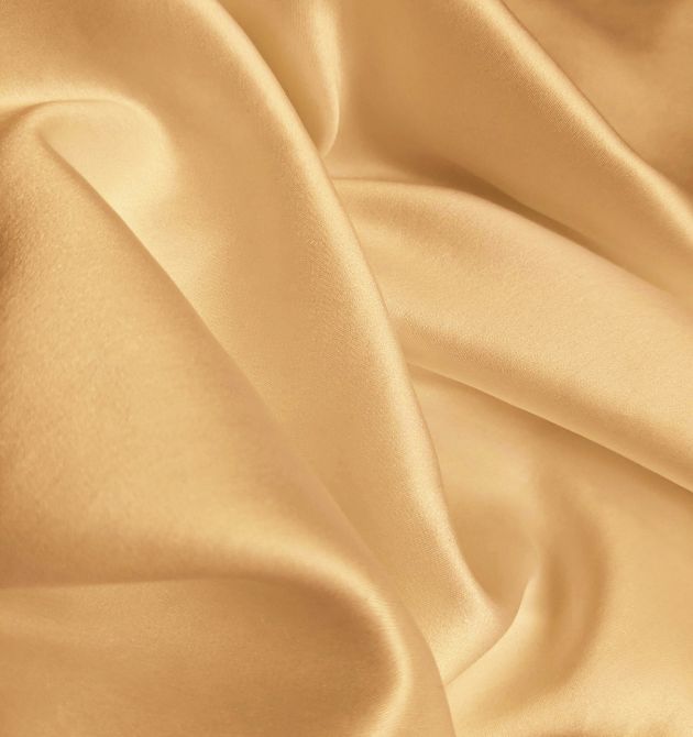 Here is the image of the Light Cream color cloth which is the material example of Silk material which is made using the best yarn weaving machine in India